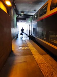 Blurred motion of train at railroad station