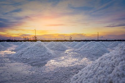 Salt farm in the morning with sunrise sky. organic sea salt. brine salt.