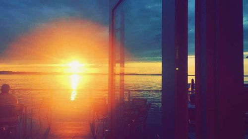 Scenic view of sea against sky during sunset