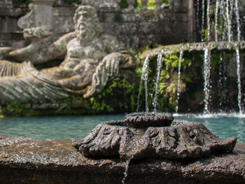 Statue fountain in garden