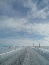 Road against sky during winter