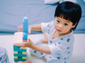Close-up of boy playing with toy blocks