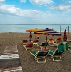 Deck chairs on beach