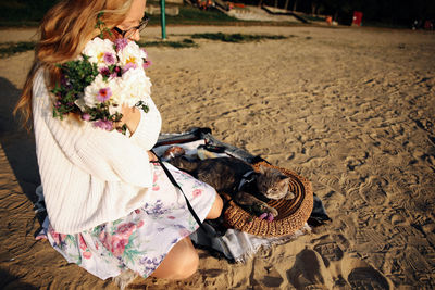 High angle view of woman sitting at park