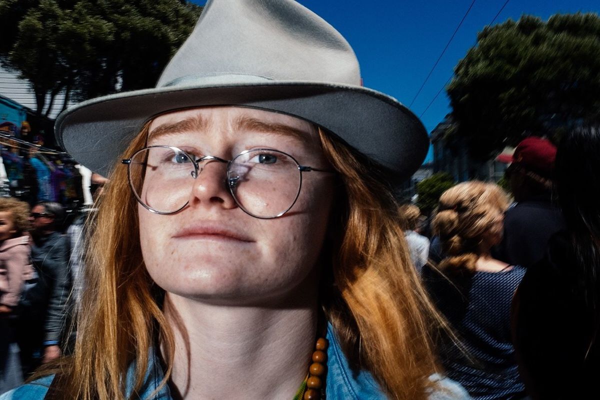 portrait, headshot, real people, hat, eyeglasses, lifestyles, women, glasses, looking at camera, adult, young adult, people, leisure activity, incidental people, females, young women, front view, day, teenager, hairstyle, human face