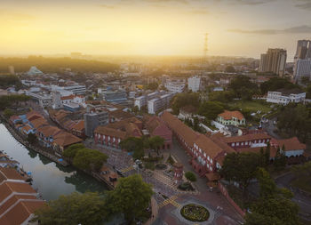 High angle view of townscape against sky during sunset