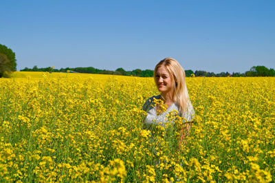 Scenic view of field against clear sky