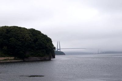 View of suspension bridge over river