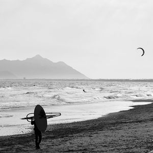 People surfing on beach