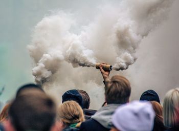 Rear view of people against the sky