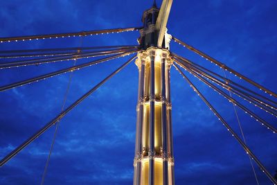 Low angle view of bridge against blue sky