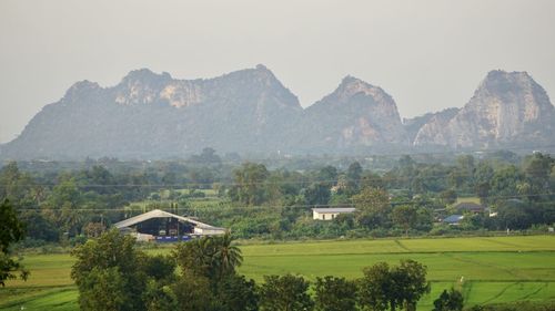 Scenic view of landscape and mountains against sky