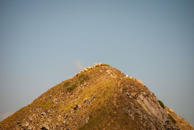 Low angle view of mountain against clear sky