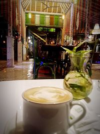 Close-up of coffee served on table at cafe