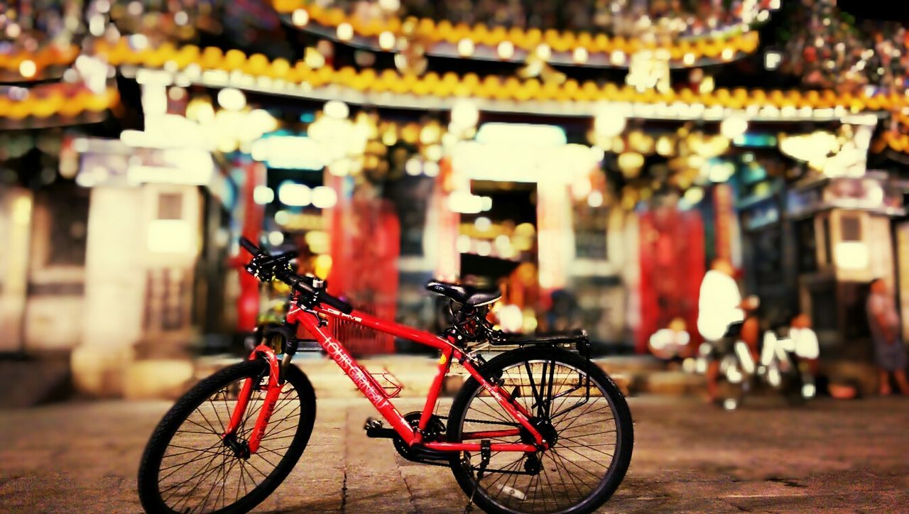 bicycle, transportation, mode of transport, architecture, building exterior, built structure, land vehicle, street, parking, stationary, focus on foreground, parked, city, outdoors, travel, selective focus, day, no people, side view, incidental people