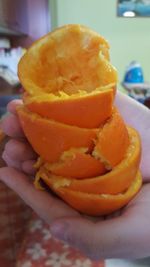 Close-up of hand holding ice cream