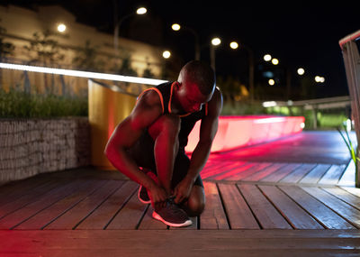 African american runner preparing for training