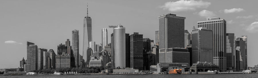 Modern buildings in city against sky