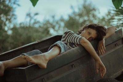 Portrait of woman relaxing outdoors