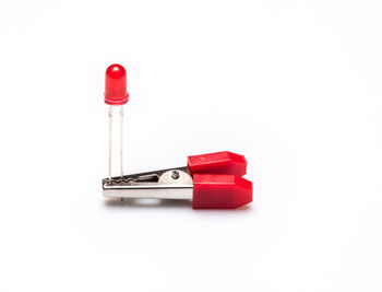 Close-up of red fire hydrant against white background