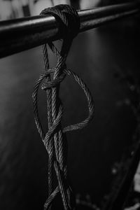 Close-up of rope tied on metal