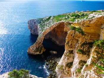 High angle view of rock formation in sea