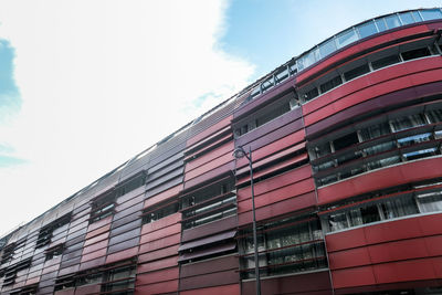 Low angle view of office building against sky