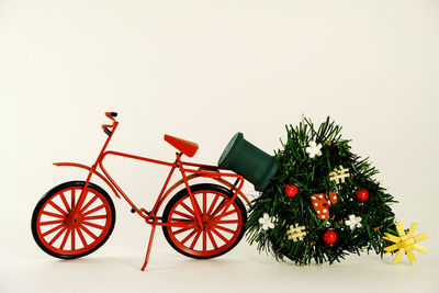 Close-up of christmas tree against white background