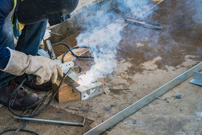 Welder working at construction site