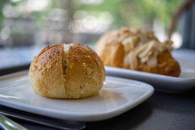 Close-up of bread in plate on table