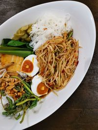 High angle view of meal served in plate on table