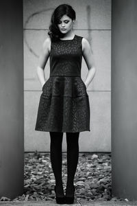 Young woman standing in park