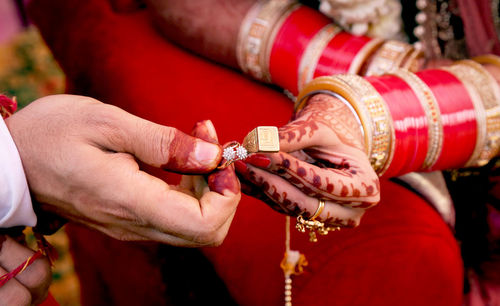 Close-up of woman holding hands