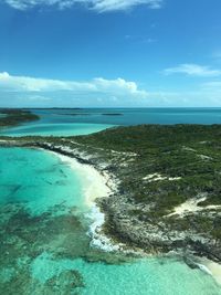 Scenic view of sea against blue sky