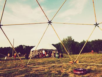 People on grassy field