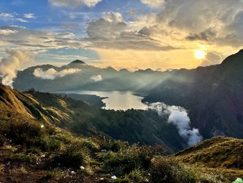 Scenic view of mountains against sky during sunset