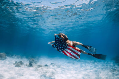 Man swimming in sea