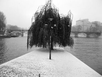 Gazebo in city against sky