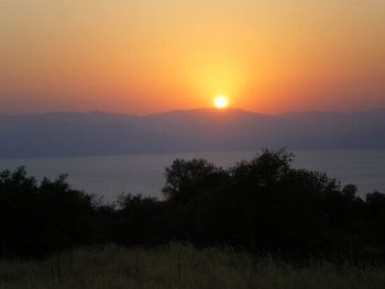 Scenic view of mountains at sunset