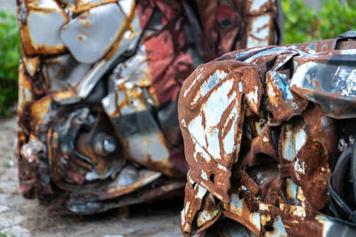 Abandoned rusty pressed piece of car