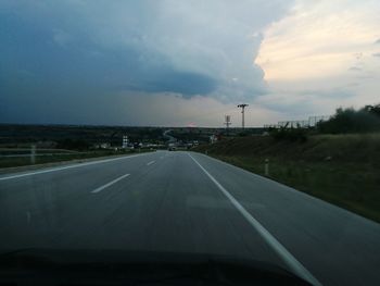 Road seen through car windshield