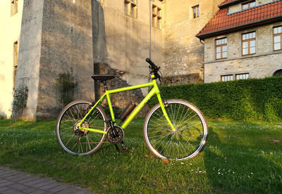 Bicycle parked in front of building