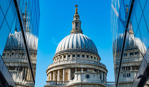 Low angle view of building against blue sky