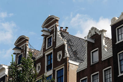 Low angle view of buildings against sky