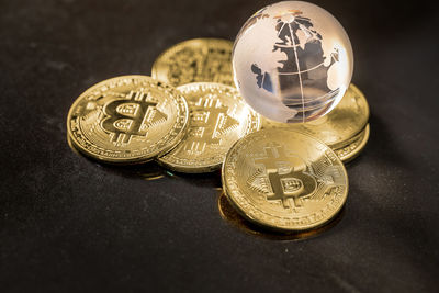 Close-up of coins on table