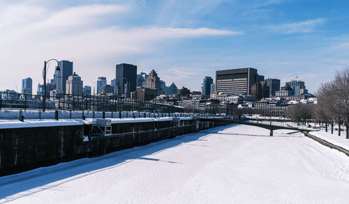 View of buildings in city during winter