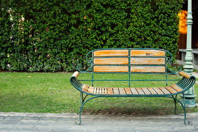 Empty bench in park