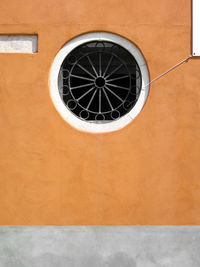 Low angle view of window on building wall