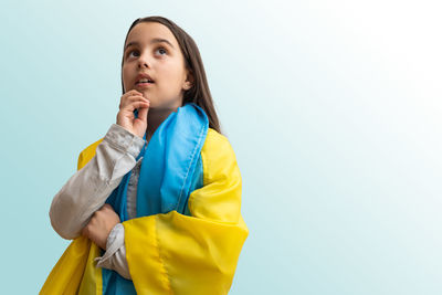 Little girl with the flag of ukraine