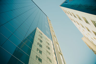 Low angle view of building against blue sky